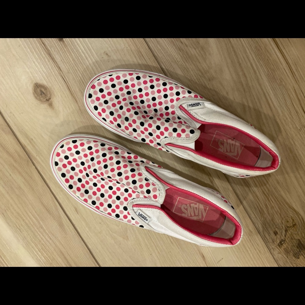 pink and white dotted vans